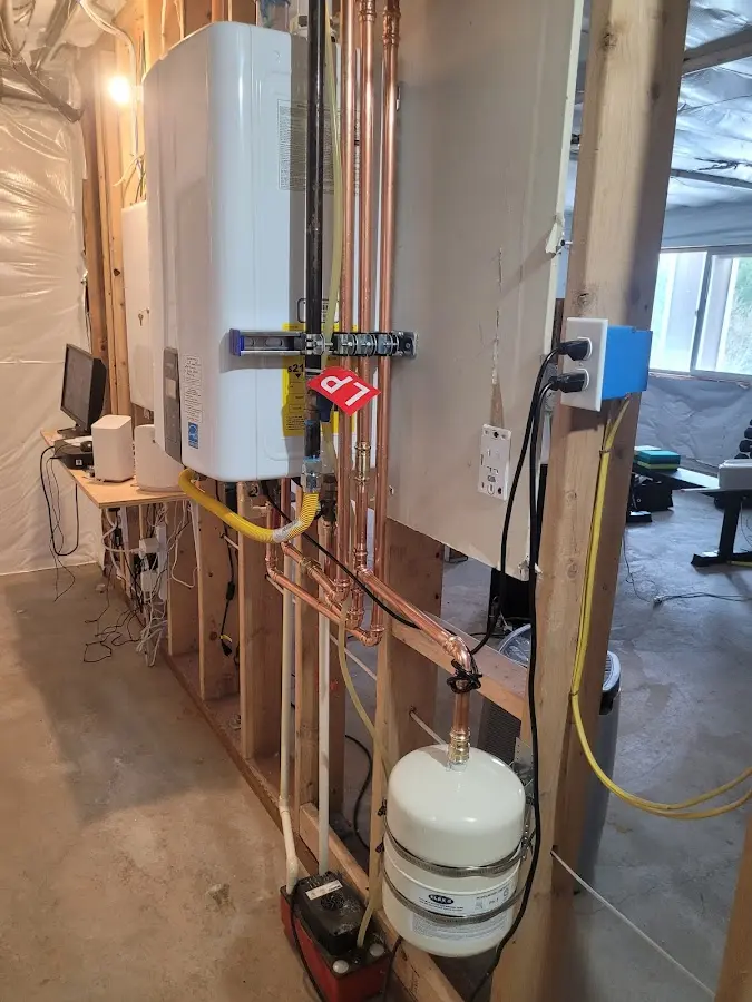 Licensed plumber repairing a kitchen sink in Apple Valley